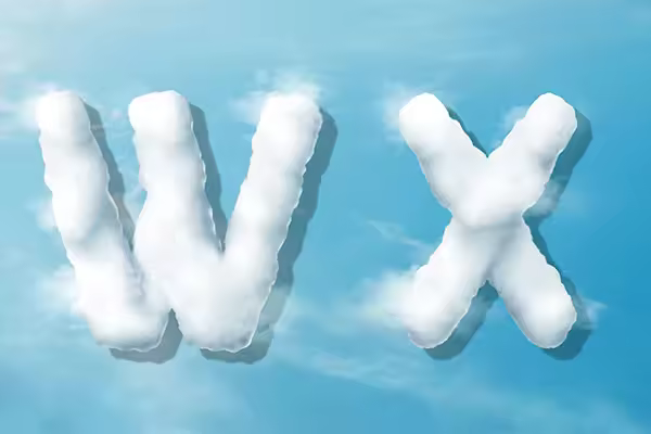 字母“WX”蓝天背景白云英文字母艺术字体psd素材